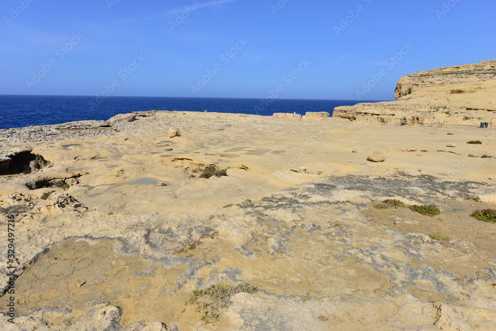 Dwejra bay and all that is left of the Azure window after a storm in March 2017 Dwejra bay and all that is left of the Azure window after a storm in March 2017