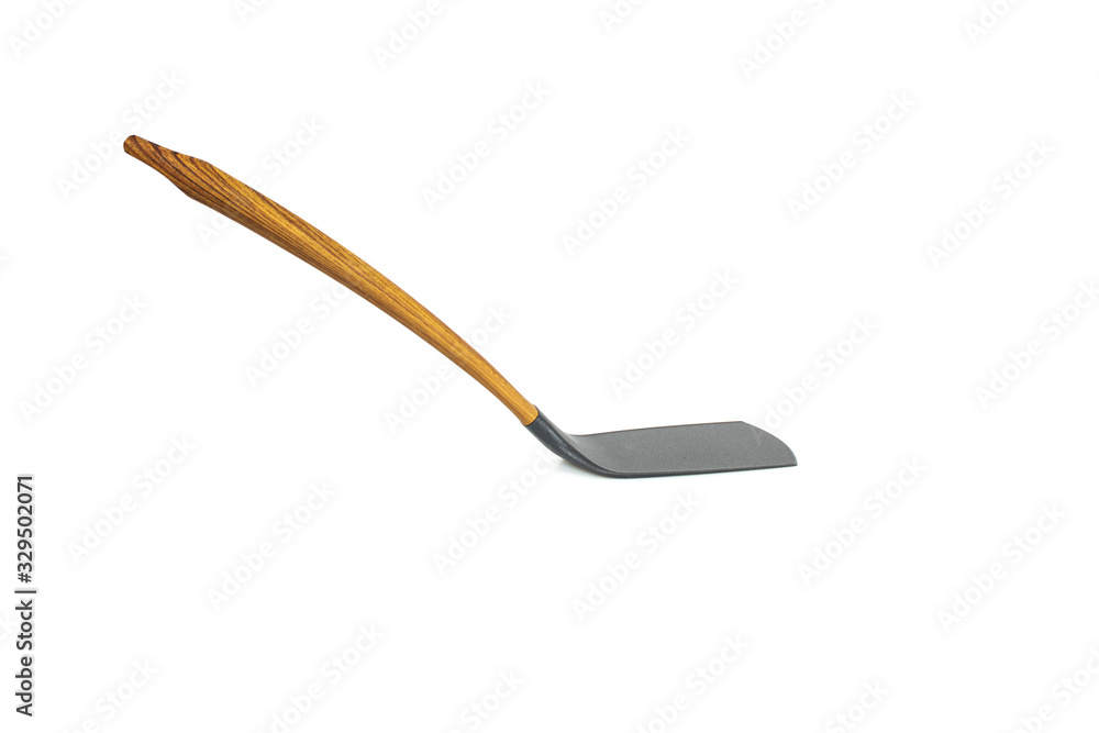 Kitchen spatula made of heat-resistant plastic with a wooden handle. Isolated on a white background. Kitchen spatula made of heat-resistant plastic with a wooden handle. Isolated on a white background.