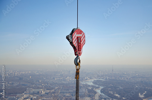 Hook from a tower crane for lifting cargo photo