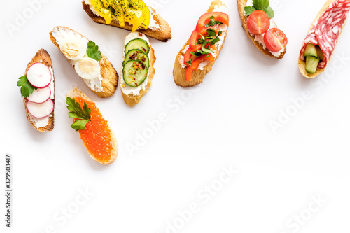 Sandwiches frame for menu design on white background top-down copy space