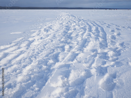 Ice on the lake in winter © enskanto