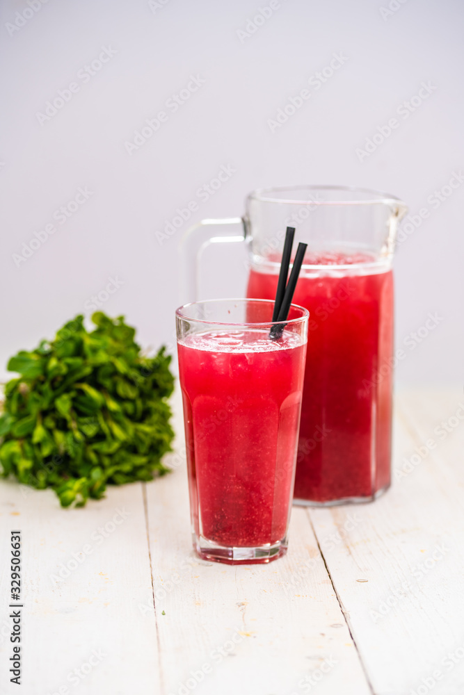 Strawberry juice. strawberry lemonade. White background. red drink. Strawberry juice. strawberry lemonade. White background. red drink.