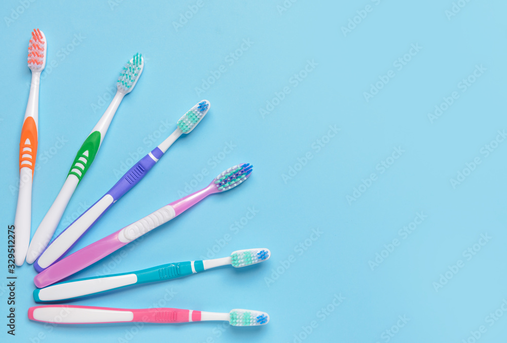 Tooth brushes on color background Tooth brushes on color background