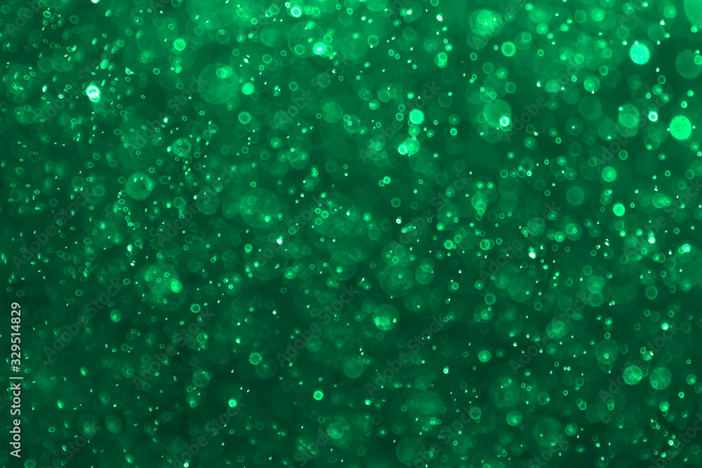 Fototapeta premium Abstract bokeh background with soft light green color background Blur wall.