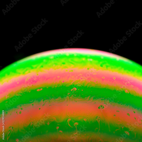bubble like a colorful planet on a dark background