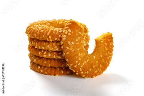 side view crispy crackers with sesame on white background photo