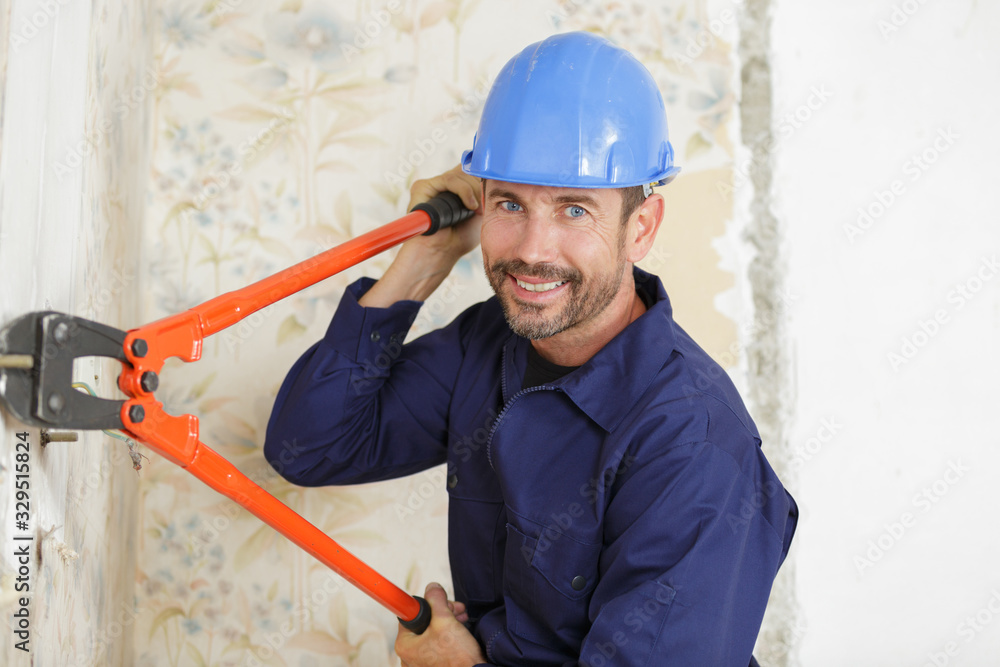 workman with scissors mower over white background workman with scissors mower over white background