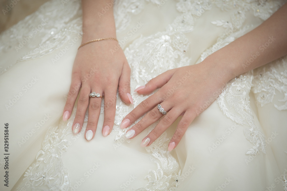 hands of the bride on the wedding day hands of the bride on the wedding day