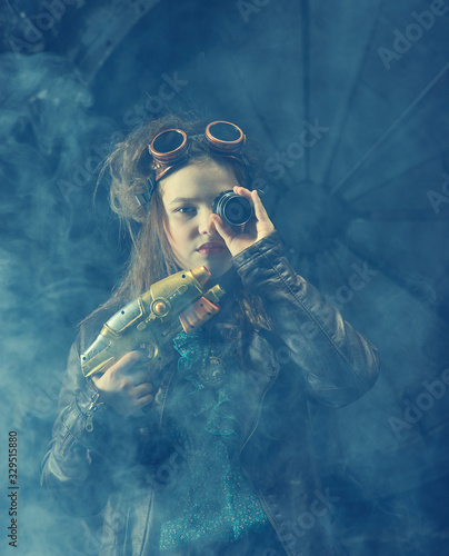Beautiful steampunk teen girl a gun