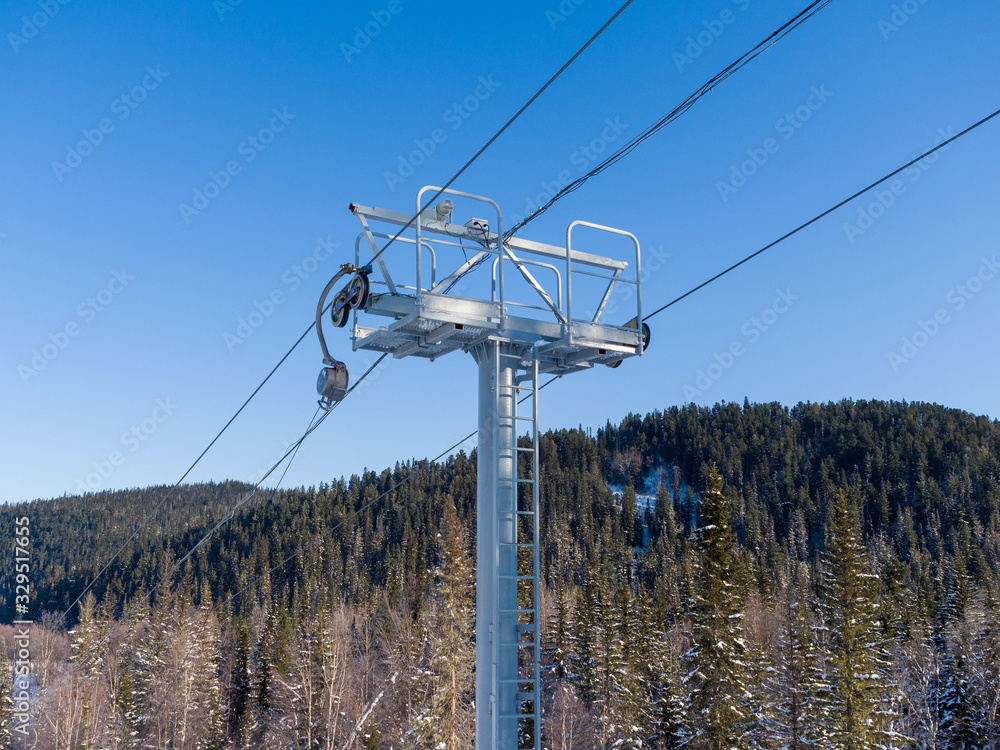 The support of a special ski lift. Winter sunny day