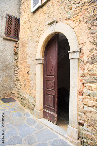 Little lane French village Casinca open church door © Ivonne Wierink