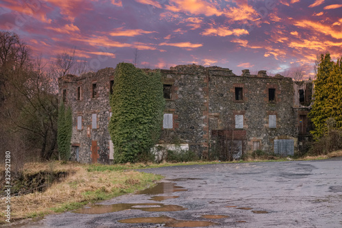 The Old Ruins Laigh Milton Mill  Near Crosshouse on the River Irvine Scotland at the end of the day at sunset.. photo