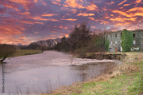 The Old Ruins Laigh Milton Mill  Near Crosshouse on the River Irvine Scotland. at the end of the day at sunset photo