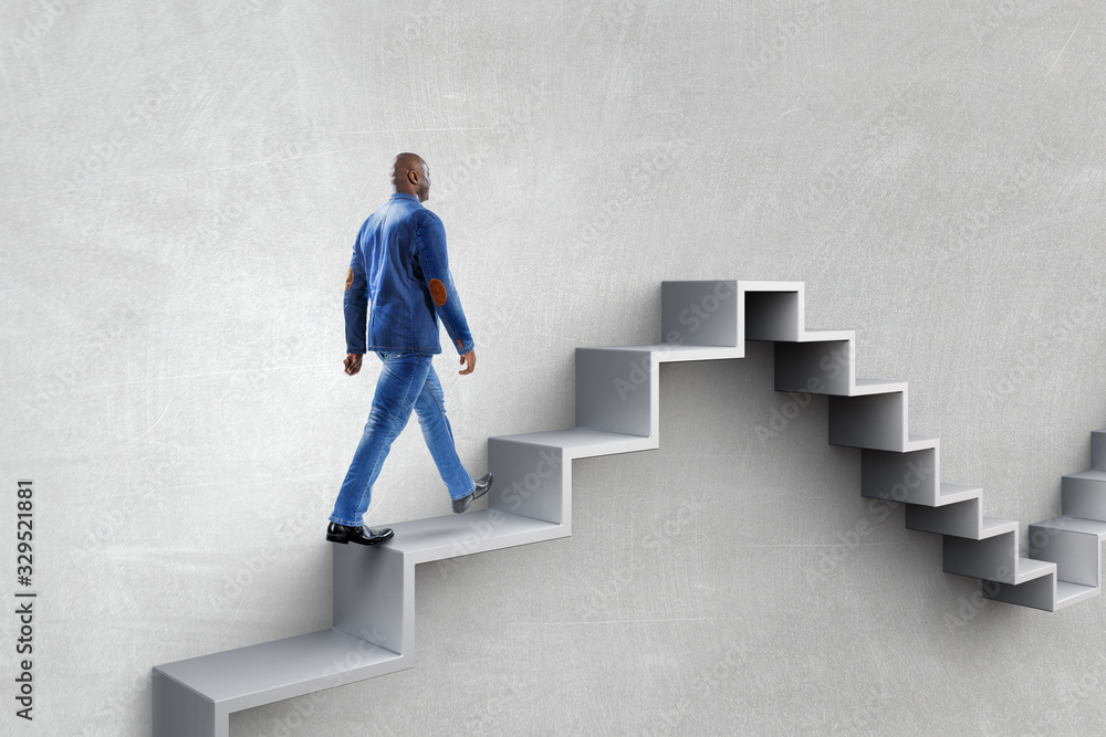Image of businessman walking upstairs Image of businessman walking upstairs