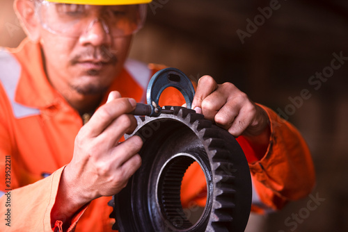 Fényképezés Measuring step block standard with outside micrometerMechanic mechanic, gear rep