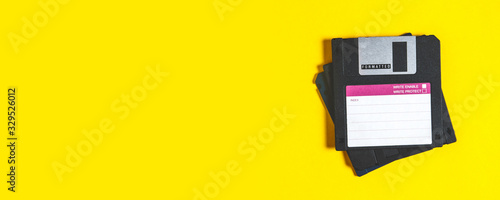 Plakat Old floppy disks for computer on yellow background