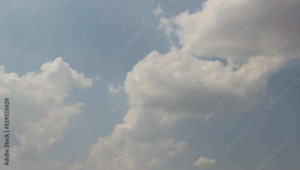 Sped up white clouds moving fast