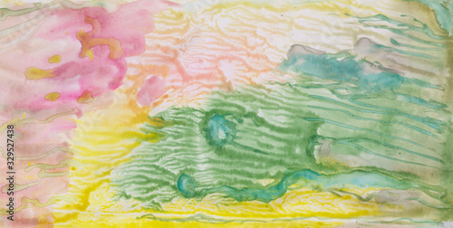 Watercolor, abstract composition in the technique of monotype, pink green and yellow stains look like a fantastic landscape