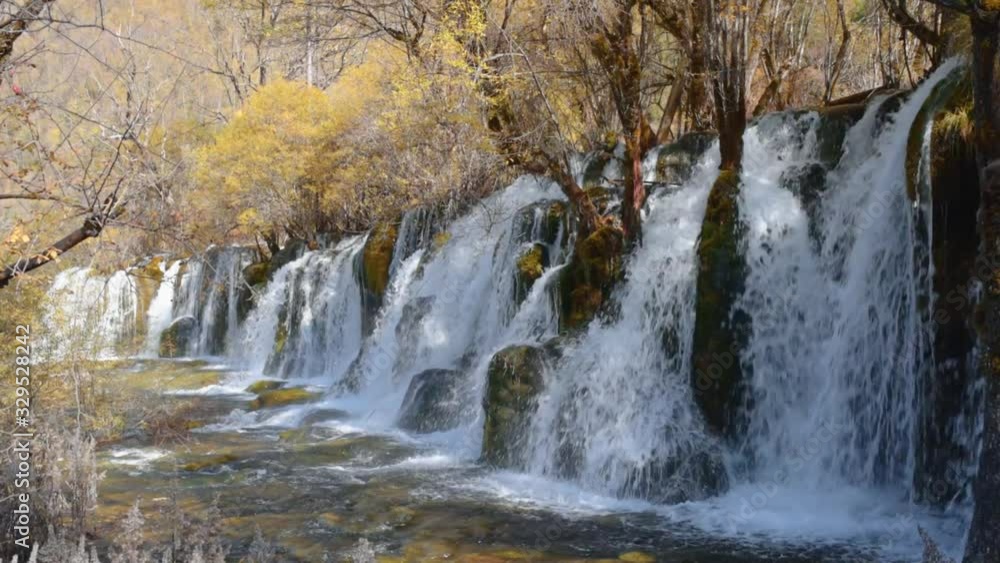 Waterfall and pond with crystal clear water Waterfall and pond with crystal clear water