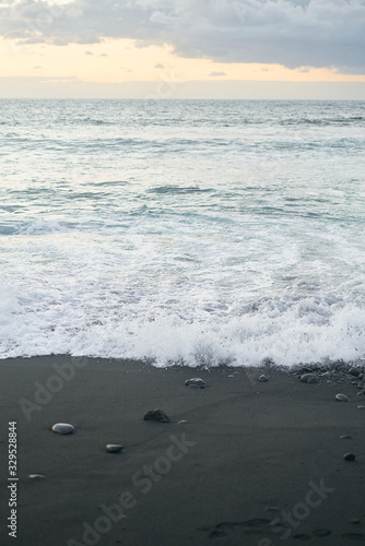 Black sand beach and ocean