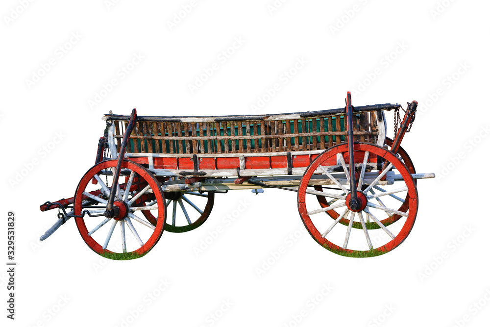 Bright red freshly painted old wooden cart on white background.