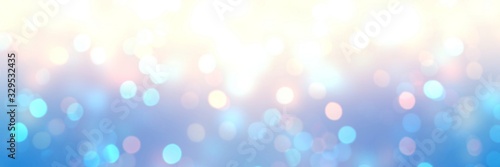 Bokeh pattern holiday banner. Empty background New Year. Blurry texture glitter. Abstract template Christmas. Defocus garland lights. Delicate yellow blue soft gradient.
