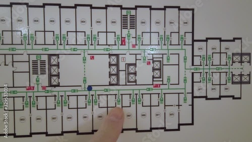 Man is studying an evacuation plan