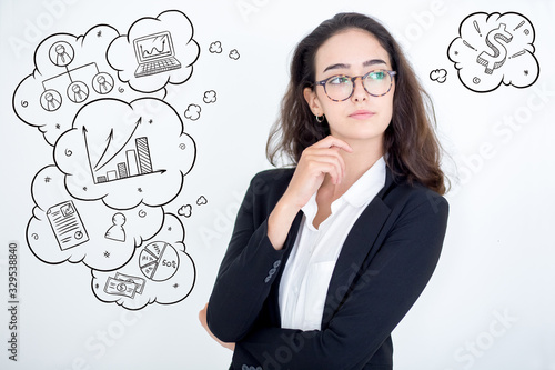 Bilde på lerret Confident woman looking away with hand drawn business sketches