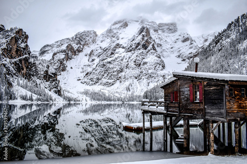 Wooden cabin on the lake Braies shore