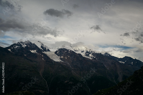 Swiss Alps, Beautiful Alps, Mountains in clouds © Ihor