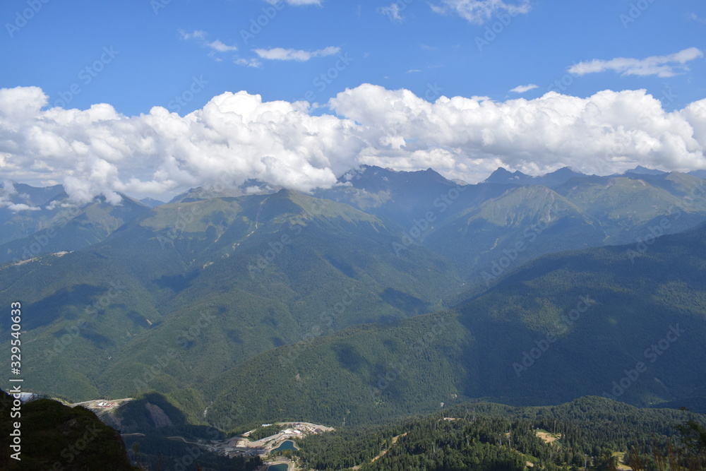 view of mountains and clouds