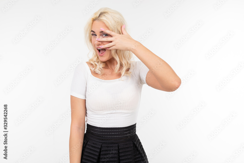 girl flirts building eyes on white background with copy space girl flirts building eyes on white background with copy space