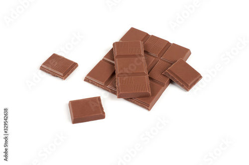 pieces of dark milk chocolate bar isolated on white background.