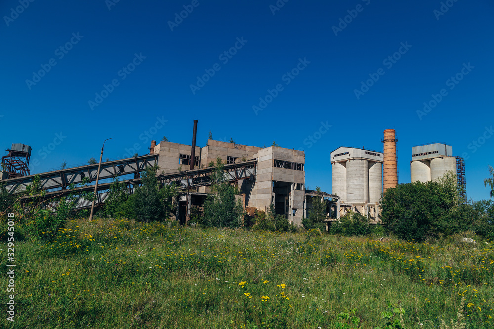 Old overgrown abandoned factory of reinforced concrete Old overgrown abandoned factory of reinforced concrete