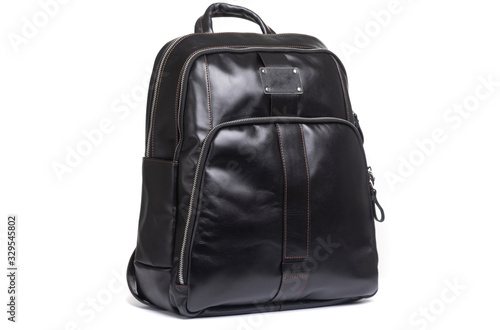 stylish leather black female backpack on a white background