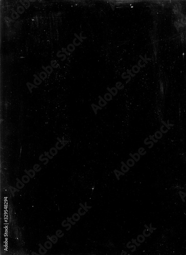 Old photographic paper useful as a layer in a photo editor -fine natural grains of dust and scratches