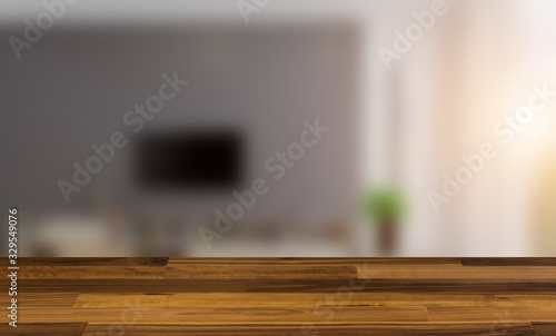 Empty interior with large window. Retro light bulb. The floor is of brown parquet. 3D rendering. wooden table. blurred background