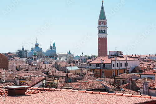 Landscape and architecture of Venice from the top of Fondaco dei Tedeschi, historical city in the north of Italy in a beautiful summer day photo