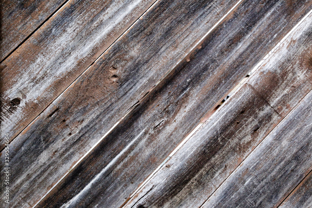 Old wooden painted fence. Painted boards. Background. Old wooden painted fence. Painted boards. Background.