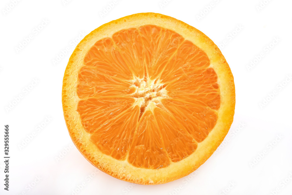Ripe orange shot on a white background, isolated Ripe orange shot on a white background, isolated
