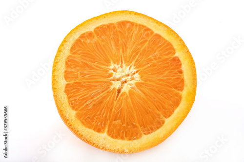   Ripe orange shot on a white background  isolated