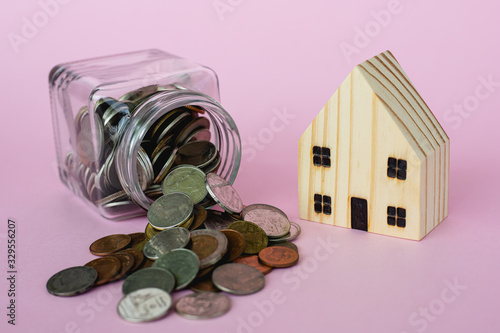 Wooden house model with mon...