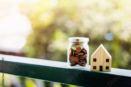 Wooden house model with mon...