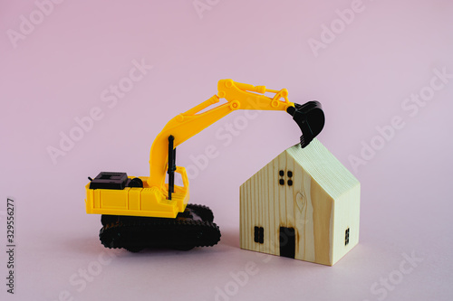 Wooden houses with excavato...