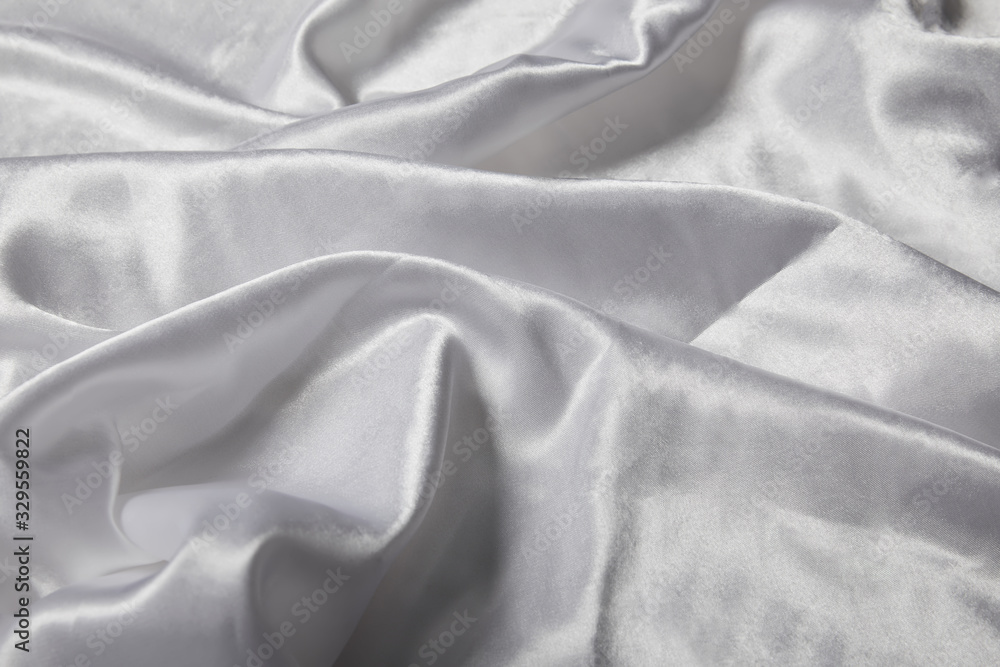 Obraz premium close up view of white soft and crumpled silk textured cloth