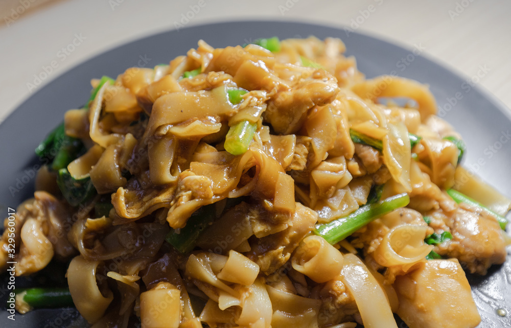 Close-up view of pad see ew, stir fried rice noodle. Close-up view of pad see ew, stir fried rice noodle.
