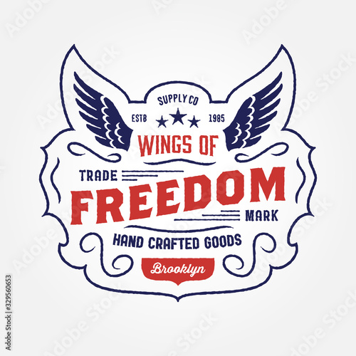 'Wings of Freedom' vintage company logo t-shirt design