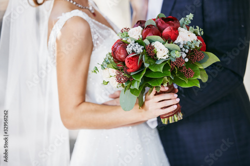 wedding bouquet in bride's hands