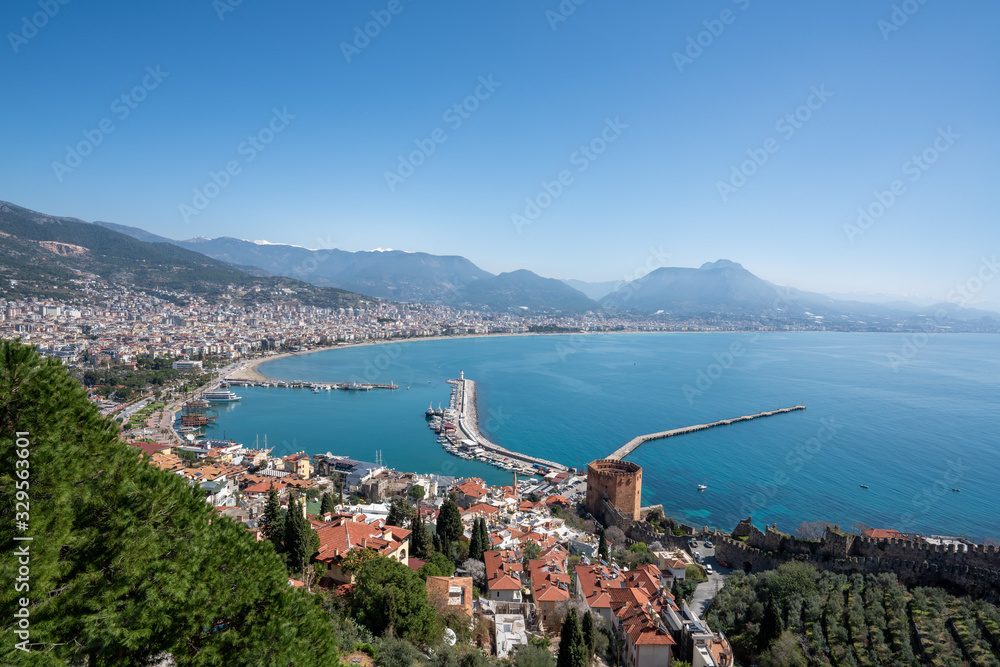 An aerial view of the bay Alanya in Antalya Turkey. Sea and city with an open sky.