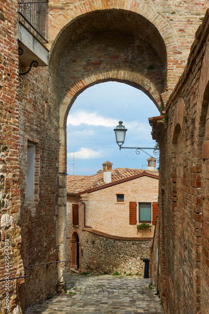 Medieval street and gate in Santarcangelo di Romagna town
